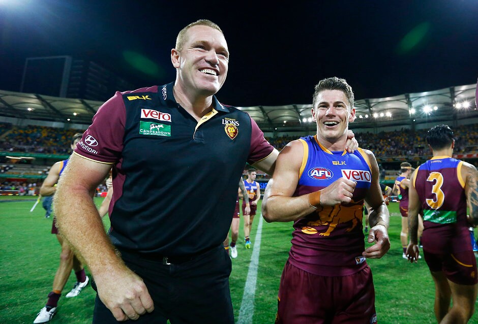 AFL 2016 Rd 04 - Brisbane v Gold Coast BRISBANE, AUSTRALIA - APRIL 16: Justin Leppitsch and Dayne Zorko celebrate during the 2016 AFL Round 04 match between the Brisbane Lions and the Gold Coast Suns at The Gabba, Brisbane on April 16, 2016. (Photo by Jason O'Brien/AFL Media)